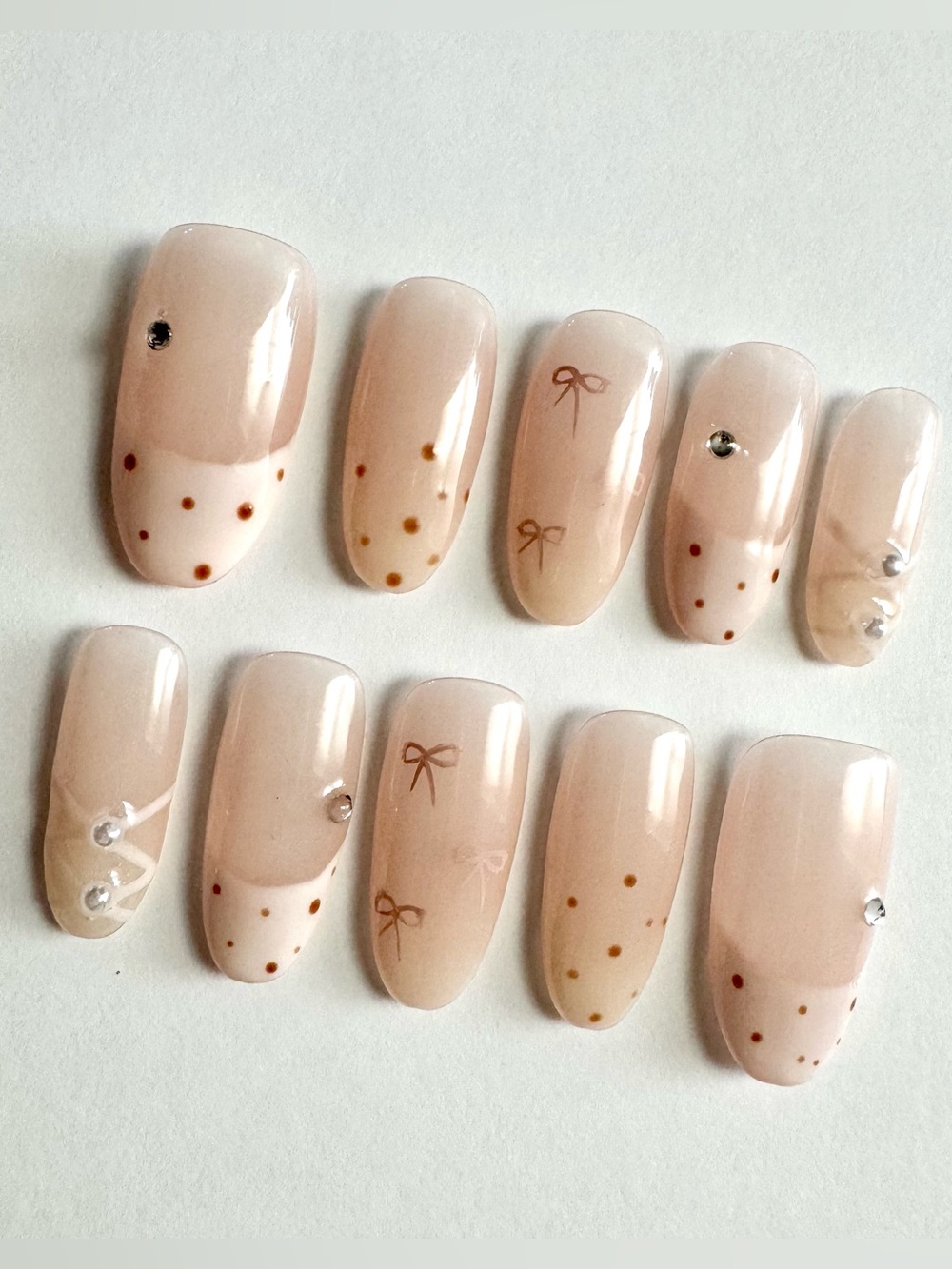 Neutral Blush Press-On Nails with Gold Dot & Bow Accents
